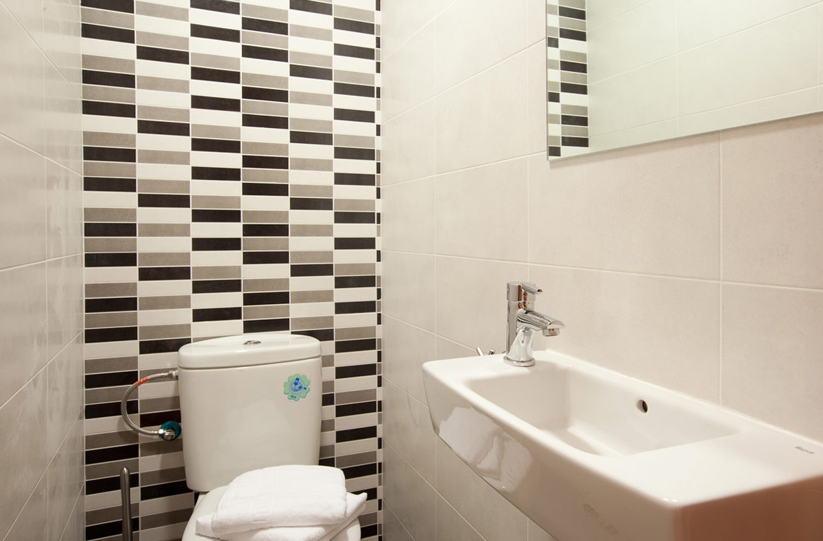 Toilet with tiled floor